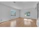 Open living room offers wood-look floors, bright windows, and neutral walls at , Henderson, NV 89011