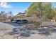 Assigned covered parking space with mature landscaping and shade trees at , Henderson, NV 89011