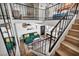 View of the second floor showing the open living concept, stairs, and railings at 1025 Willow Tree Dr # B, Las Vegas, NV 89128