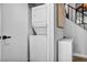 Efficient laundry area with stacked washer and dryer for space-saving convenience at 1025 Willow Tree Dr # B, Las Vegas, NV 89128
