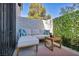 Cozy patio area with comfortable seating and privacy screens at 1025 Willow Tree Dr # B, Las Vegas, NV 89128