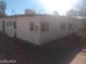 Rear and side exterior featuring bright exterior paint with a desert landscape at 1317 Exley Ave, Las Vegas, NV 89104
