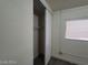 This bedroom features plank floors, a closet with sliding doors, and a window at 1317 Exley Ave, Las Vegas, NV 89104