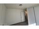 A clean bedroom with plank floors has a ceiling light and a closet at 1317 Exley Ave, Las Vegas, NV 89104