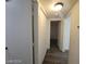 Hallway with wood-look floors and access to other rooms at 1317 Exley Ave, Las Vegas, NV 89104
