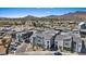 Aerial view of a modern residential community with desert mountains in the background at 143 Aqua Commons Ln, Henderson, NV 89015