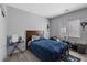 Bedroom with grey walls, carpet, and a queen-size bed at 143 Aqua Commons Ln, Henderson, NV 89015