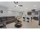 Open-concept living space with a modern kitchen and stylish living area, perfect for entertaining at 143 Aqua Commons Ln, Henderson, NV 89015