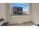 Relaxing patio view showcasing a modern home design with balcony, black railings and exterior paint at 143 Aqua Commons Ln, Henderson, NV 89015