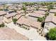 Aerial view of a neighborhood showcasing the house and its surroundings at 1440 Summer Glow Ave, Henderson, NV 89012