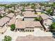 Aerial view of a neighborhood showcasing the house and its surroundings at 1440 Summer Glow Ave, Henderson, NV 89012