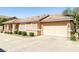 Single-story home showing attached garage, well maintained landscaping, and appealing architectural details at 1440 Summer Glow Ave, Henderson, NV 89012