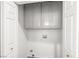Bright laundry room with storage cabinets at 1440 Summer Glow Ave, Henderson, NV 89012