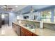 Bright kitchen featuring stainless steel appliances, stone countertops, and modern faucet at 1727 Cherokee Ln, Las Vegas, NV 89169