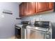 Laundry room featuring modern washer and dryer at 1727 Cherokee Ln, Las Vegas, NV 89169