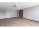Large, well-lit living room featuring a ceiling fan and double french doors at 1727 Cherokee Ln, Las Vegas, NV 89169