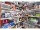 Walk-in pantry with white shelves and clear containers for easy organization at 1727 Cherokee Ln, Las Vegas, NV 89169