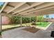 Covered patio area with a view of the landscaped backyard at 1940 Canterbury Dr, Las Vegas, NV 89119