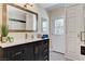 Bathroom with a vanity, and a large framed mirror at 1940 Canterbury Dr, Las Vegas, NV 89119