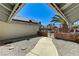Exterior shot of a landscaped yard and a brick and wrought iron entrance gate at 1940 Canterbury Dr, Las Vegas, NV 89119