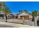 Charming home with a well-maintained yard, gated driveway, and solar panels at 1940 Canterbury Dr, Las Vegas, NV 89119