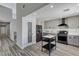 Well-lit kitchen with sleek appliances, subway tile backsplash, and a convenient pantry at 1940 Canterbury Dr, Las Vegas, NV 89119