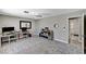 Versatile room with neutral tones, set up as a home office with desk space and storage options at 1940 Canterbury Dr, Las Vegas, NV 89119