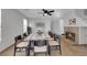 Dining room showcases a large dining table and a fireplace at 204 Appian Way, Henderson, NV 89002