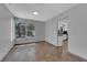 Open living space with tile flooring and a view of the kitchen at 204 Appian Way, Henderson, NV 89002