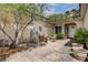 Inviting courtyard with a tranquil fountain and charming outdoor seating area at 2078 Wildwood Lake St, Henderson, NV 89052