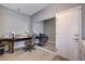Office space with a large mirror, desk, sewing machine, and ample workspace at 2078 Wildwood Lake St, Henderson, NV 89052