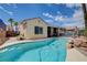Inviting pool provides a perfect backdrop to this backyard oasis at 2078 Wildwood Lake St, Henderson, NV 89052