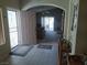 Inviting foyer with tile flooring leads into a bright living space, offering a welcoming entrance at 2148 Hidden Ranch Ter, Henderson, NV 89052