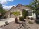 Charming single-story home with desert landscaping and a two-car garage in a sunny neighborhood at 2148 Hidden Ranch Ter, Henderson, NV 89052