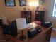 Comfortable home office space with desk, bookshelves and neutral paint at 2148 Hidden Ranch Ter, Henderson, NV 89052