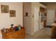 Bright kitchen featuring white appliances, tile flooring, and breakfast bar at 2148 Hidden Ranch Ter, Henderson, NV 89052