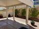 Covered patio space featuring brick flooring, climbing vines, and natural light at 2295 Koho Dr # 102, Las Vegas, NV 89183
