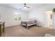 A simple but cozy bedroom with lots of natural light at 23 Strada Barbera, Henderson, NV 89011