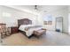 Spacious bedroom features neutral carpet, windows with views, and comfortable furnishings at 23 Strada Barbera, Henderson, NV 89011