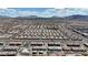 Expansive aerial perspective of a thriving community featuring a community pool and park at 236 Callen Falls Ave # 1211, Henderson, NV 89011