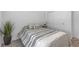 A well-lit bedroom featuring a cozy bed, white walls and decorative touches at 236 Callen Falls Ave # 1211, Henderson, NV 89011