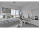 Comfortable bedroom with large windows, vanity and a small desk at 236 Callen Falls Ave # 1211, Henderson, NV 89011