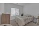 Bright bedroom with a bed, side table, and simple modern decor at 236 Callen Falls Ave # 1211, Henderson, NV 89011