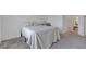 Inviting bedroom includes a plush bed and an open doorway to an ensuite bathroom with a glass shower at 236 Callen Falls Ave # 1211, Henderson, NV 89011