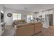 Comfortable living area adjacent to the kitchen has modern furnishings and plenty of natural light at 236 Callen Falls Ave # 1211, Henderson, NV 89011