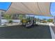 Inviting community playground with play structures under a shaded canopy at 236 Callen Falls Ave # 1211, Henderson, NV 89011