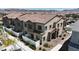 Attractive two-story townhome with a small fenced-in patio and desert landscaping at 236 Callen Falls Ave # 1211, Henderson, NV 89011