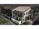 Attractive two-story townhome with a small fenced-in patio and desert landscaping at 236 Callen Falls Ave # 1211, Henderson, NV 89011