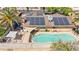 Stunning aerial view of pool, patio, and solar panels at 2426 La Pluma St, Henderson, NV 89014