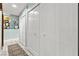 Hallway featuring multiple closets along one side, providing ample storage space and easy access at 2426 La Pluma St, Henderson, NV 89014